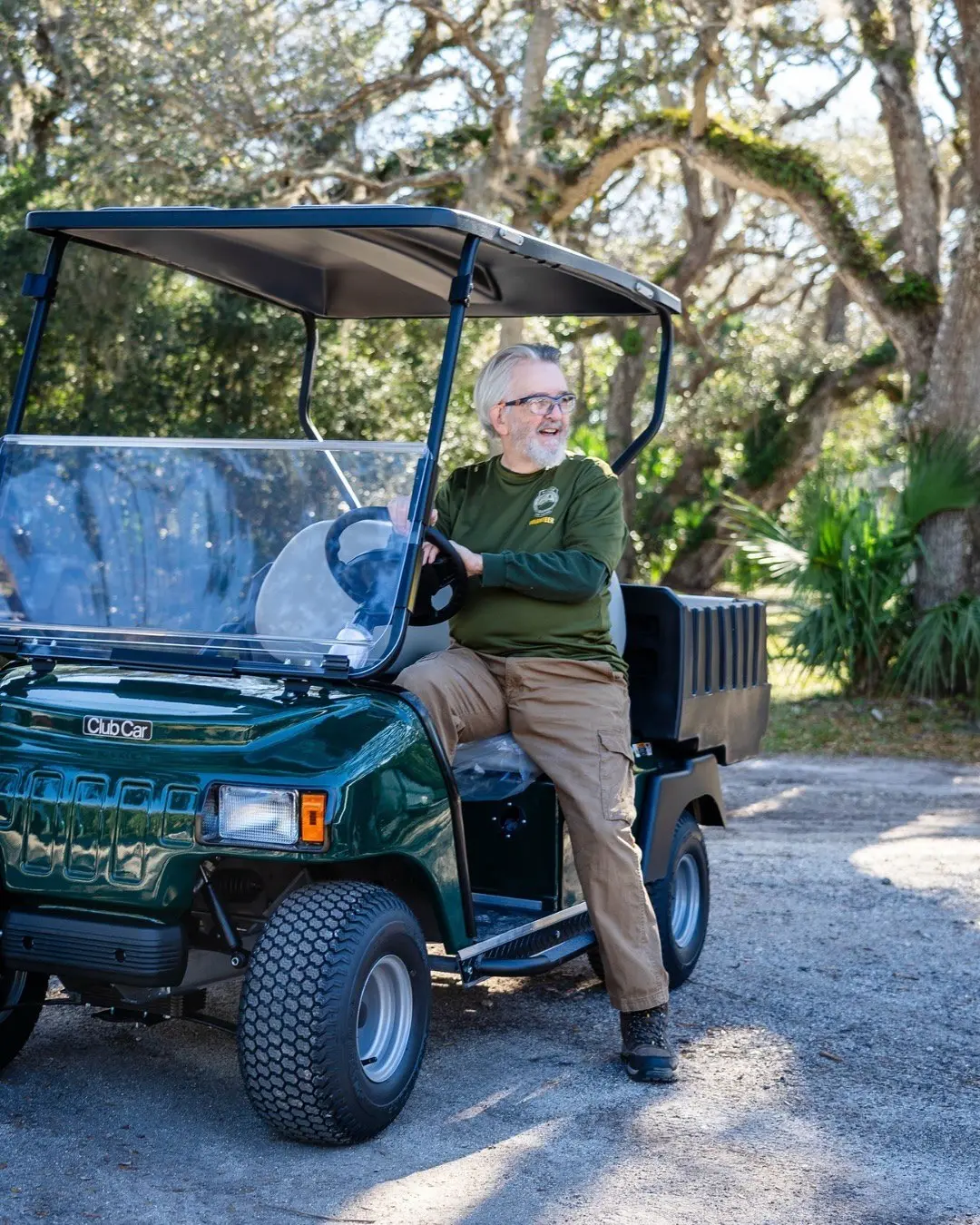 Golf cart on a shaded path